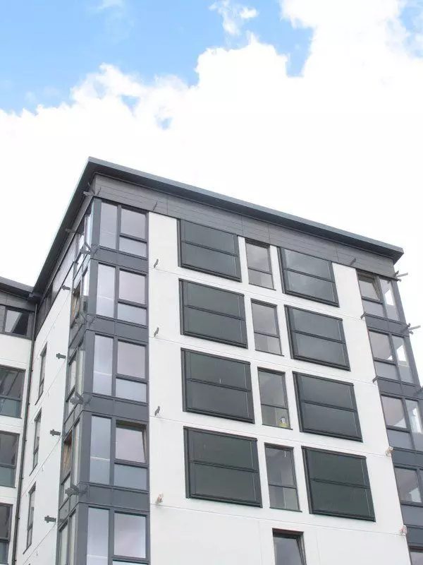 Wall integrated cladded solar thermal panels