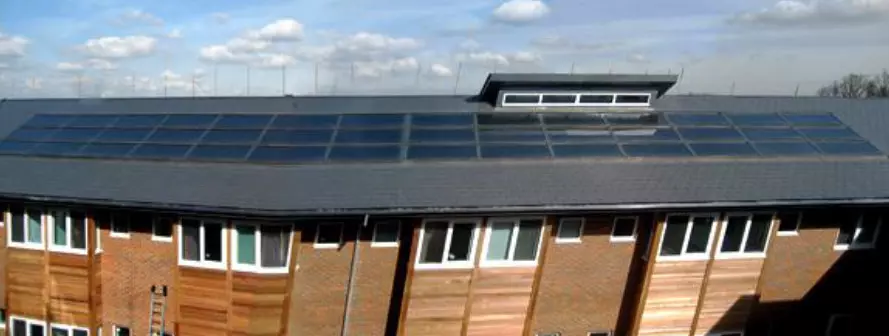 Horizontal solar panels on London hospital slate roof