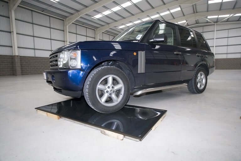 Solar water heating panel supporting SUV weight